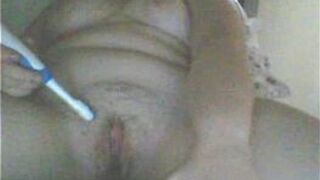 girl masturbates with toothbrush - porn video
