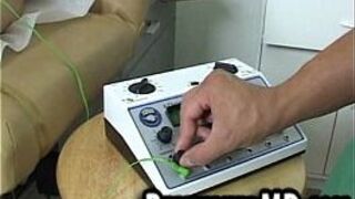 Sexy hunk patient has a toy put on his cock by the doctor - porn video